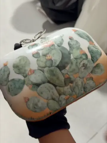 Hand-painted ceramic clutch from the #DiorCouture Fall Winter 2027 collection