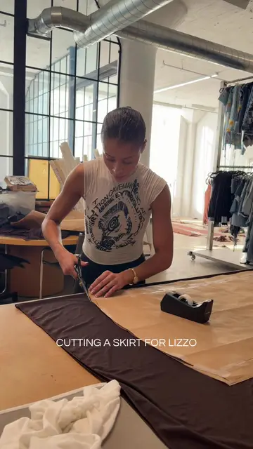 Cutting a skirt for Lizzo @SAMI MIRO VINTAGE #samimirovintage #sustainablefashi…
