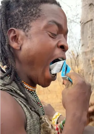 Hadzabe People try chocolate for the first time 😳🍫 #yzfamily