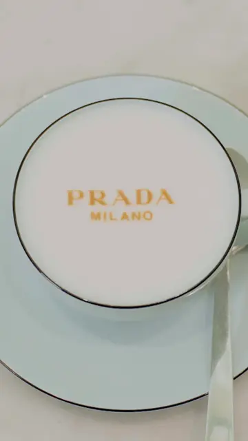 Elegance begins before the first sip. Served in Prada blue at Prada Caffè at IO…