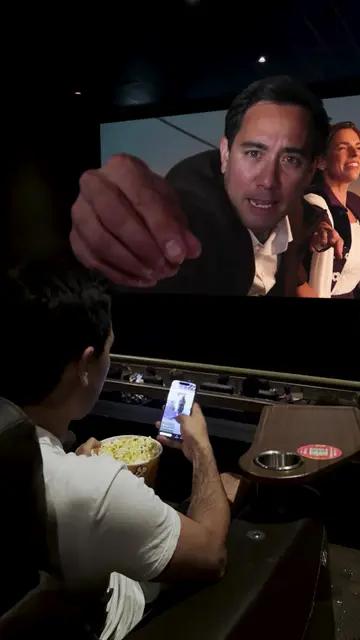 Is it ok to be on your phone during a movie? 🍿